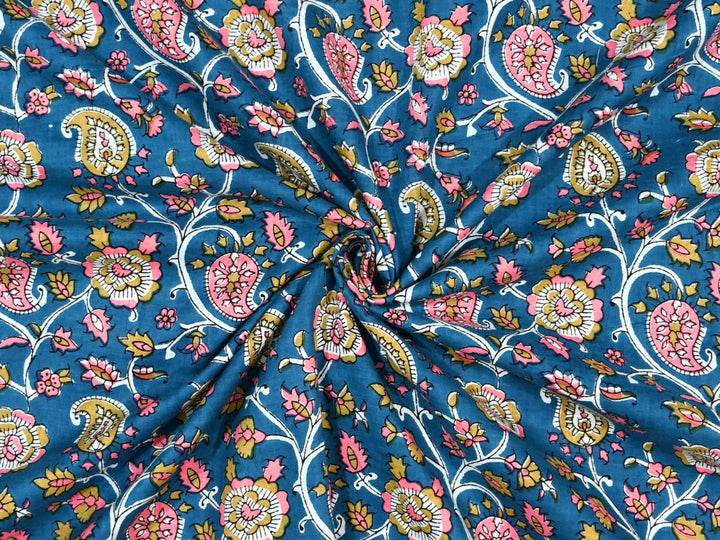 Deep blue paisley block print cotton fabric with pink and mustard motifs