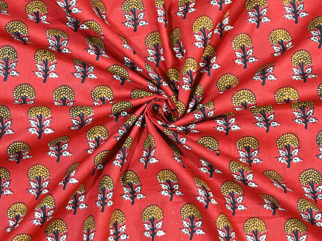 Red floral Bagru block print cotton fabric with yellow fan-shaped flowers