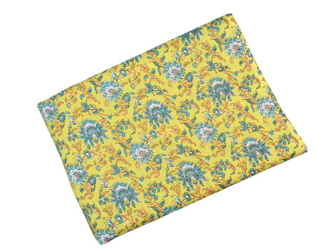 Indian woodblock print fabric with peach vines and paisley accents