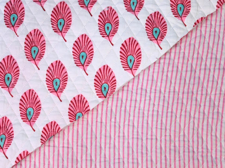 Pink feather quilted fabric by the yard with turquoise accents