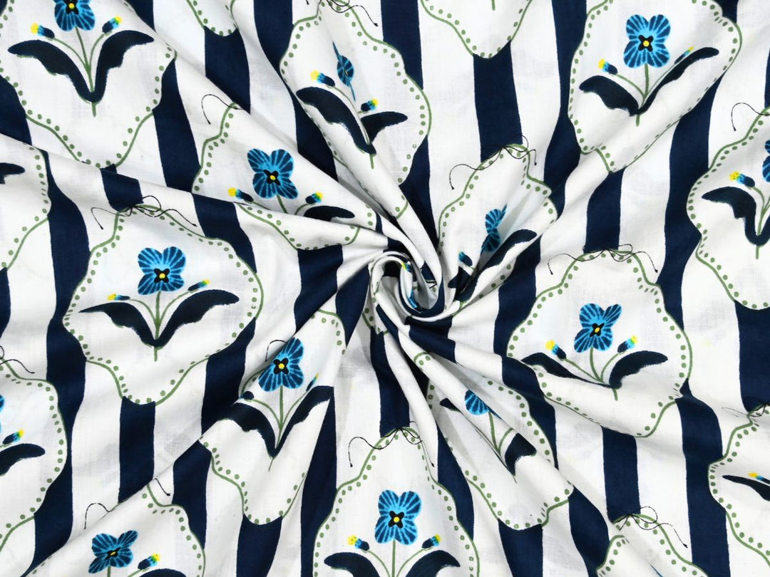 Navy and white striped cotton fabric with blue flowers in scalloped frames