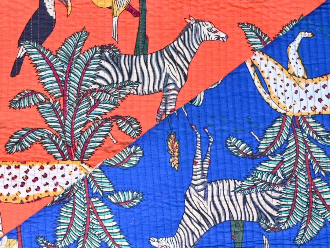 Close-up of coral quilted jungle fabric with diagonal stitch lines
