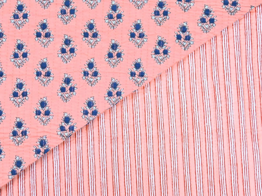 Peach quilted fabric by the yard with navy floral sprig print