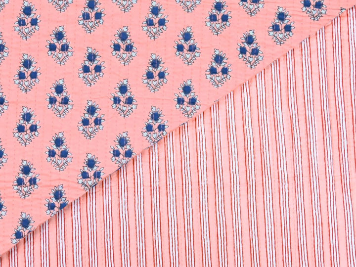 Peach quilted fabric by the yard with navy floral sprig print