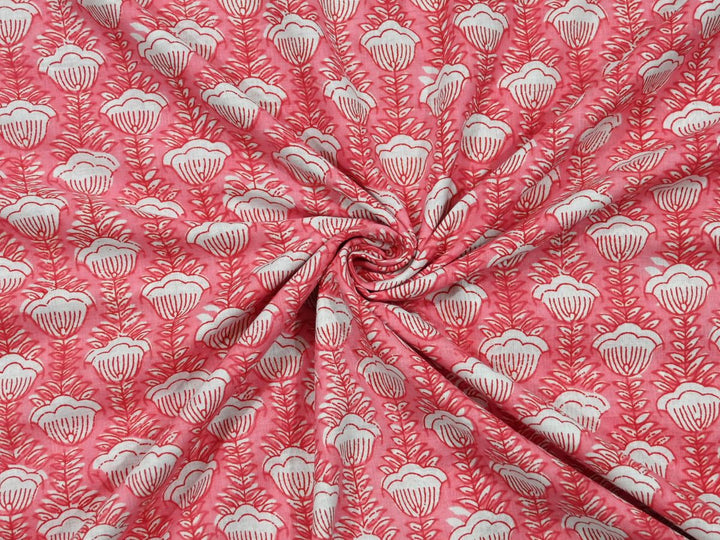 Peach floral cotton fabric by the yard with white shell-shaped flower repeat