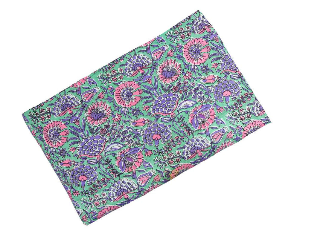 Purple floral Indian block print fabric with detailed foliage and vines