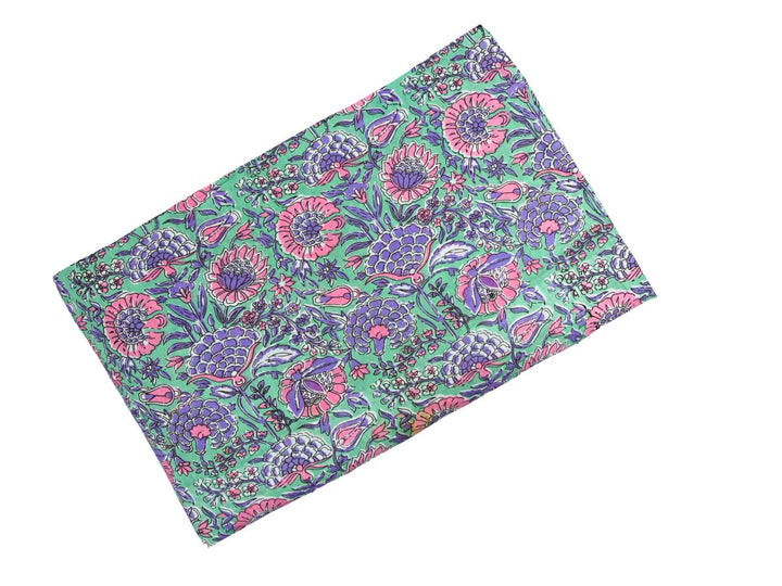 Purple floral Indian block print fabric with detailed foliage and vines