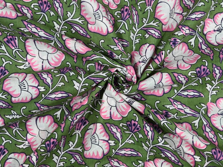 Repeating floral block print on olive green ground with white vines