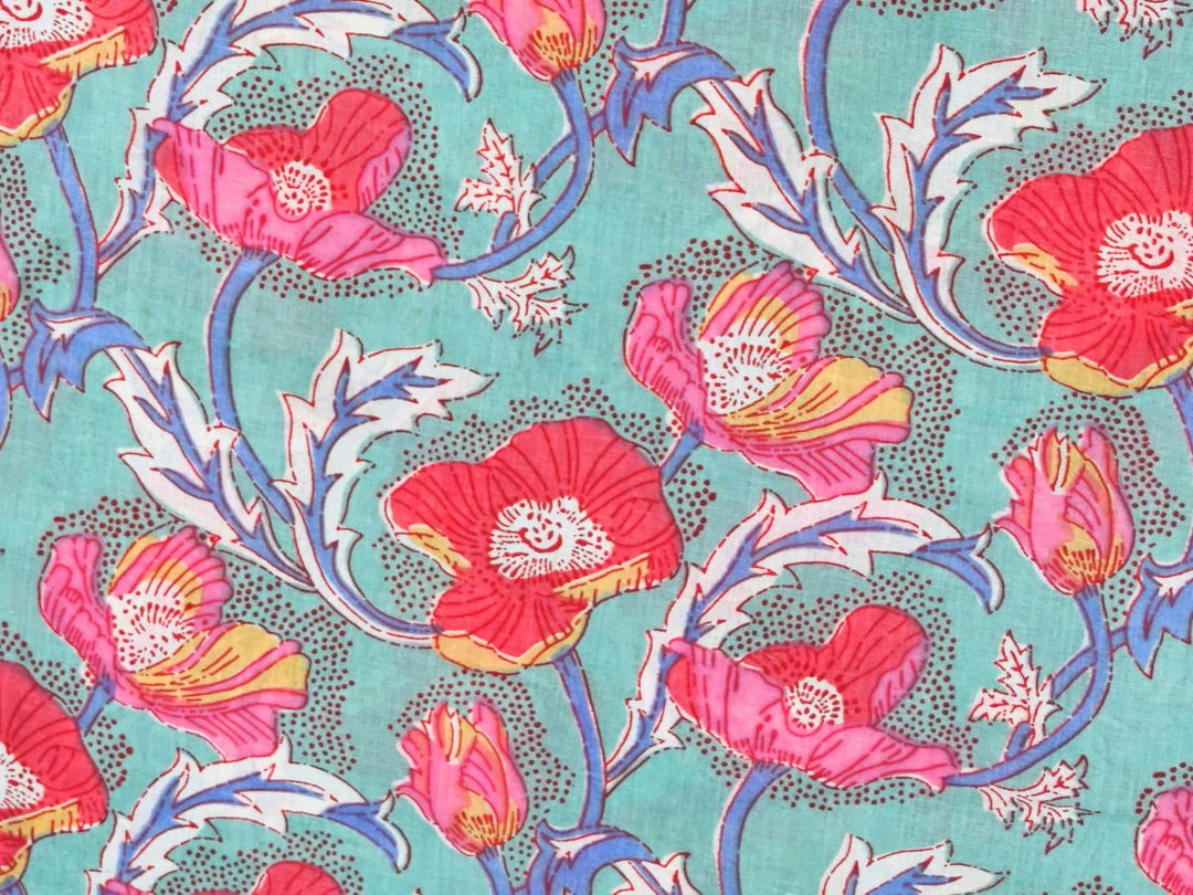 Pink poppy fabric by the yard with large-scale block print on mint green