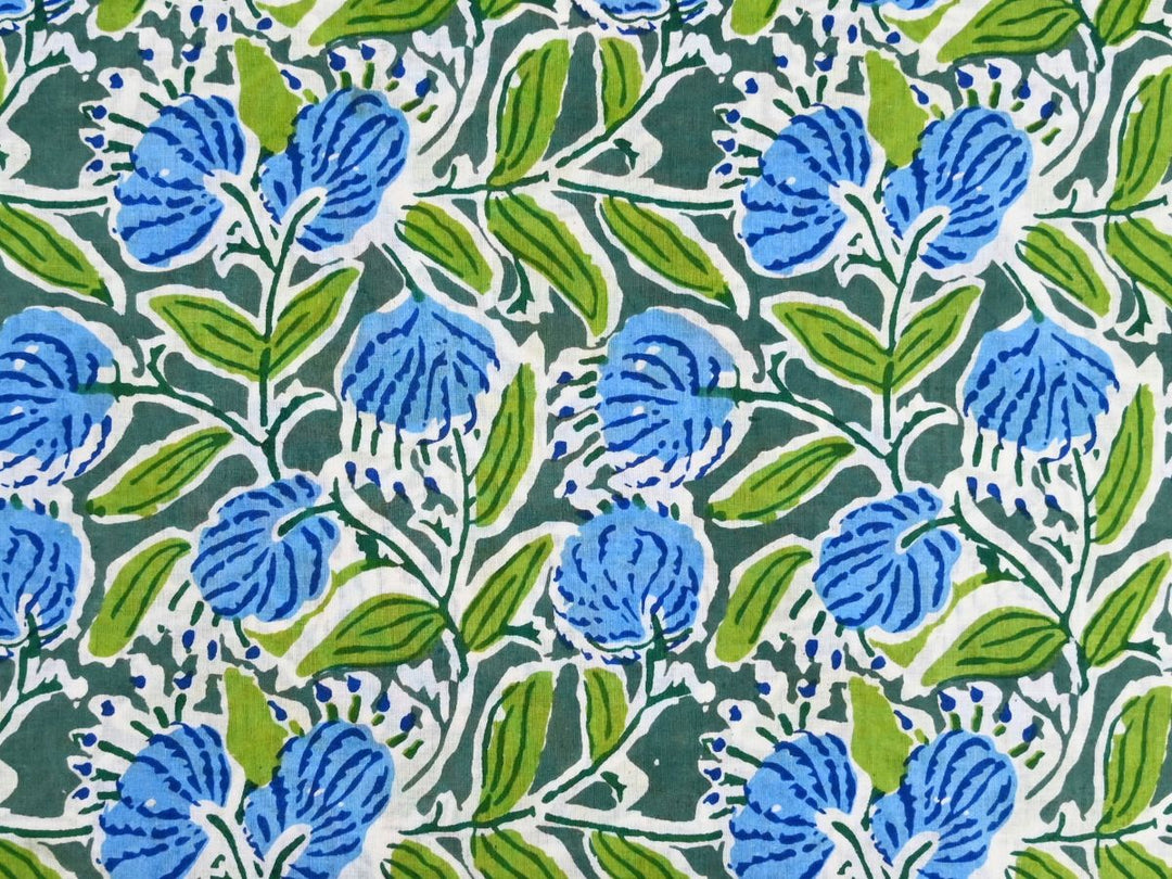 Blue green floral fabric by the metre with Indian block print on deep green