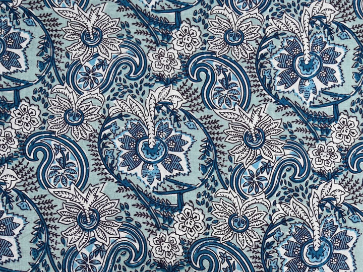 Blue paisley fabric by the metre with Indian block print on light blue