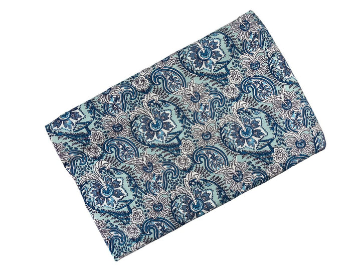 Intricate paisley floral block print fabric with swirling details