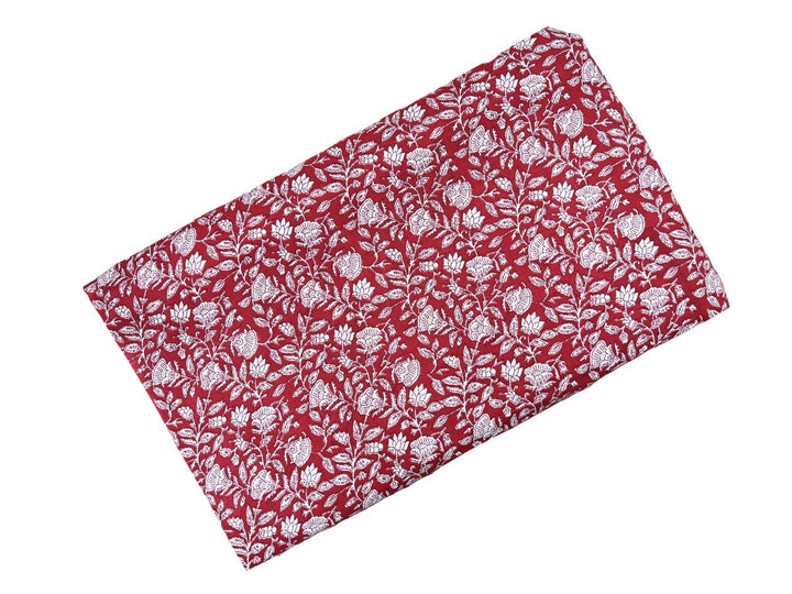 Dense white outline floral block print on deep red ground