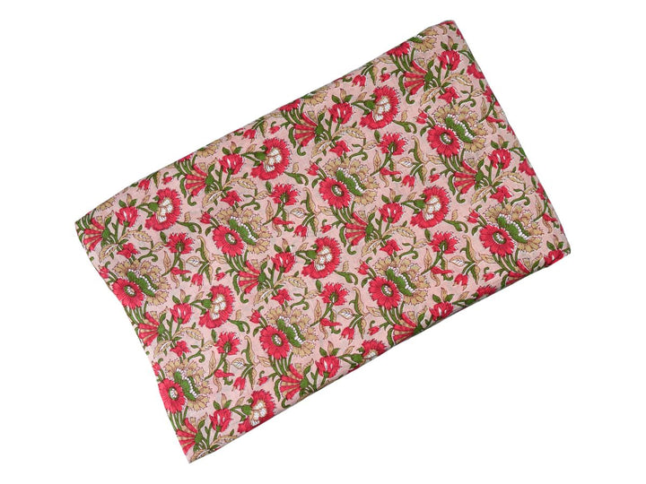 Dense floral block print fabric with fan-shaped blooms and cream medallions