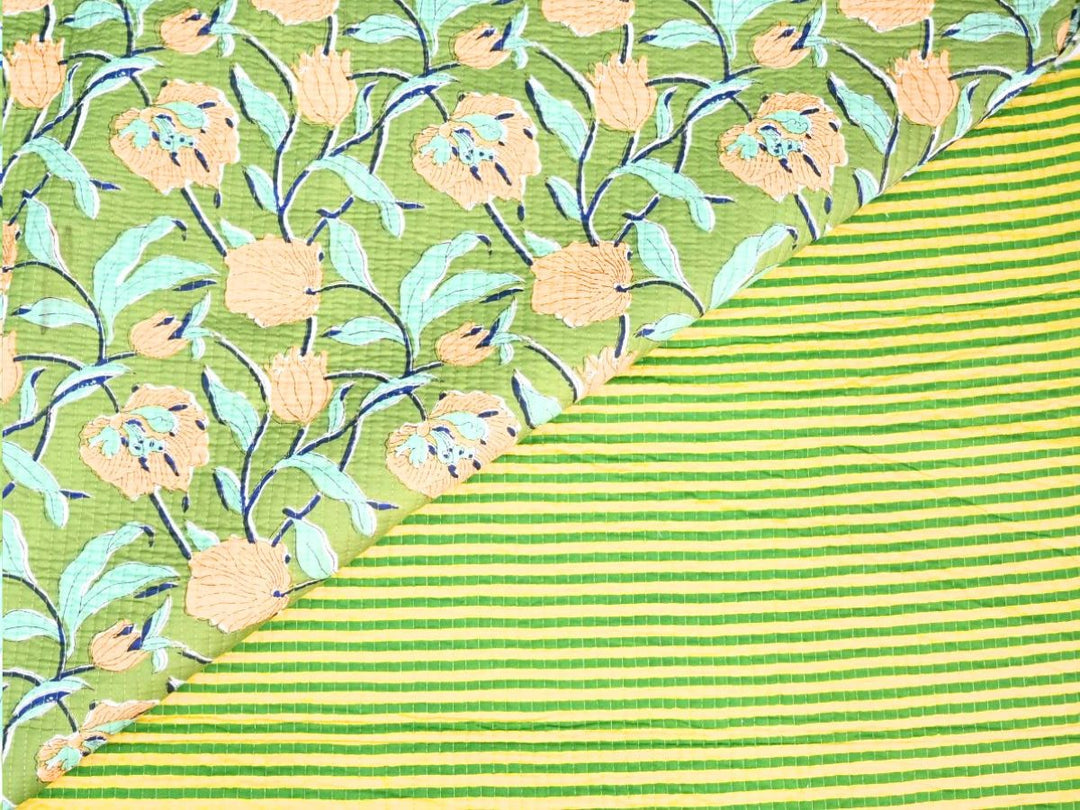 Quilted jacket fabric by the yard with green floral and peach flower print