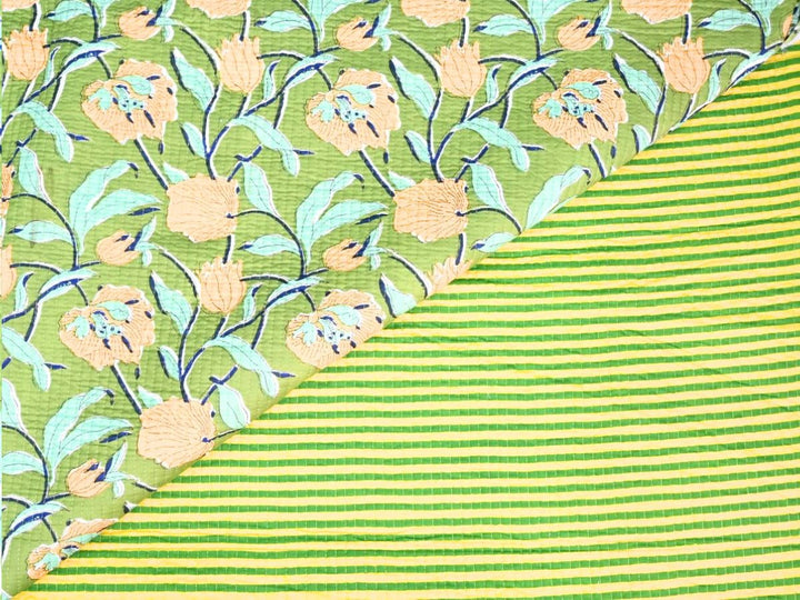 Quilted jacket fabric by the yard with green floral and peach flower print
