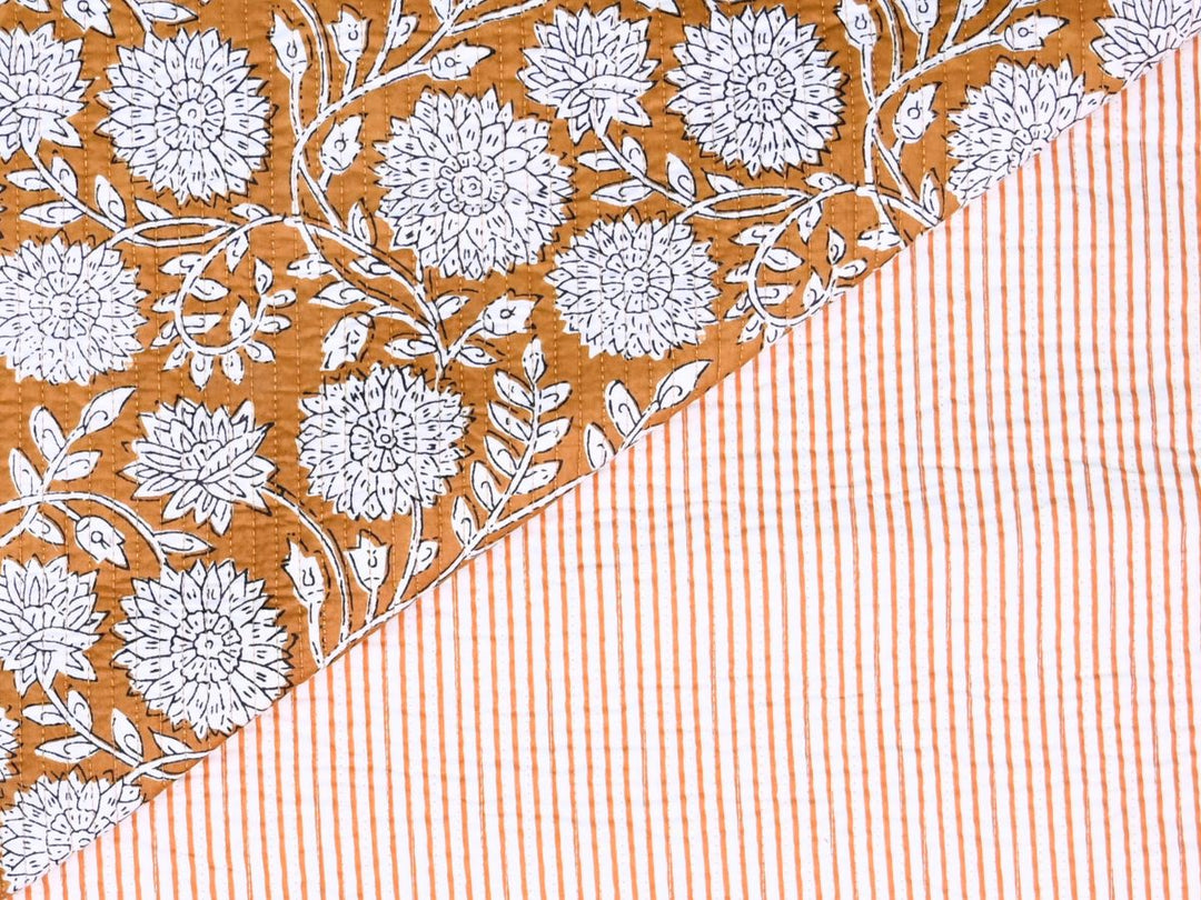 Quilted cotton fabric by the yard with mustard floral outline print