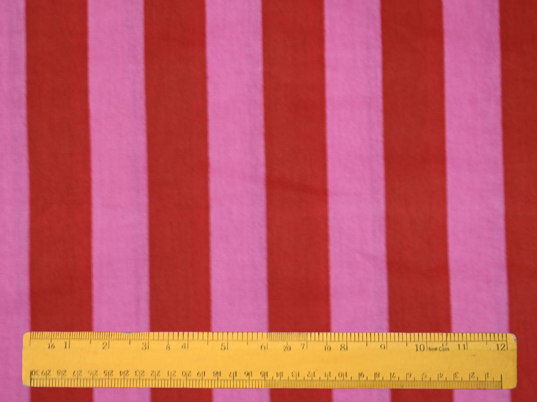 red pink stripe fabric close up - cotton fabric for dresses and sewing