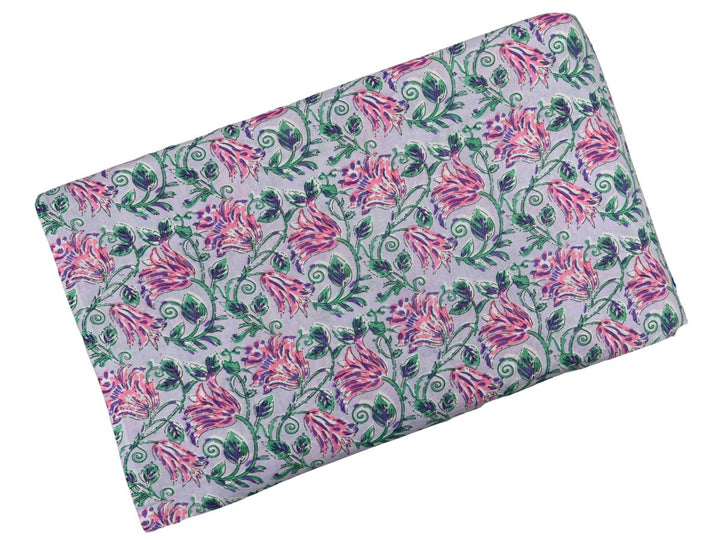 Repeating floral block print on lavender ground with spiral vine details