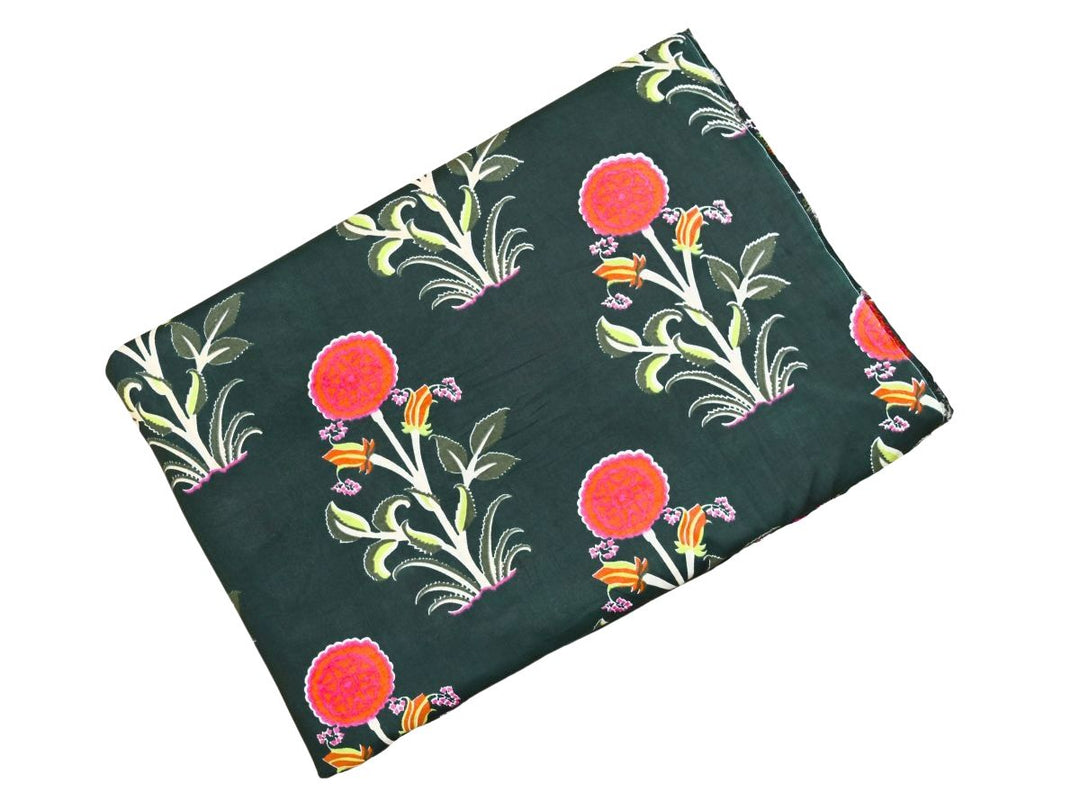Green floral block print fabric with pink scalloped flowers and orange buds