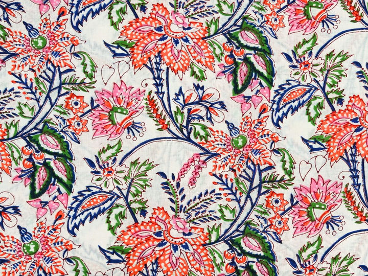 Orange floral fabric by the metre with Indian block print on white