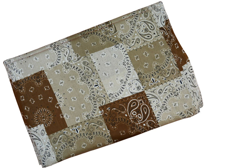 Western bandana print cotton fabric in tan, beige, and cream squares
