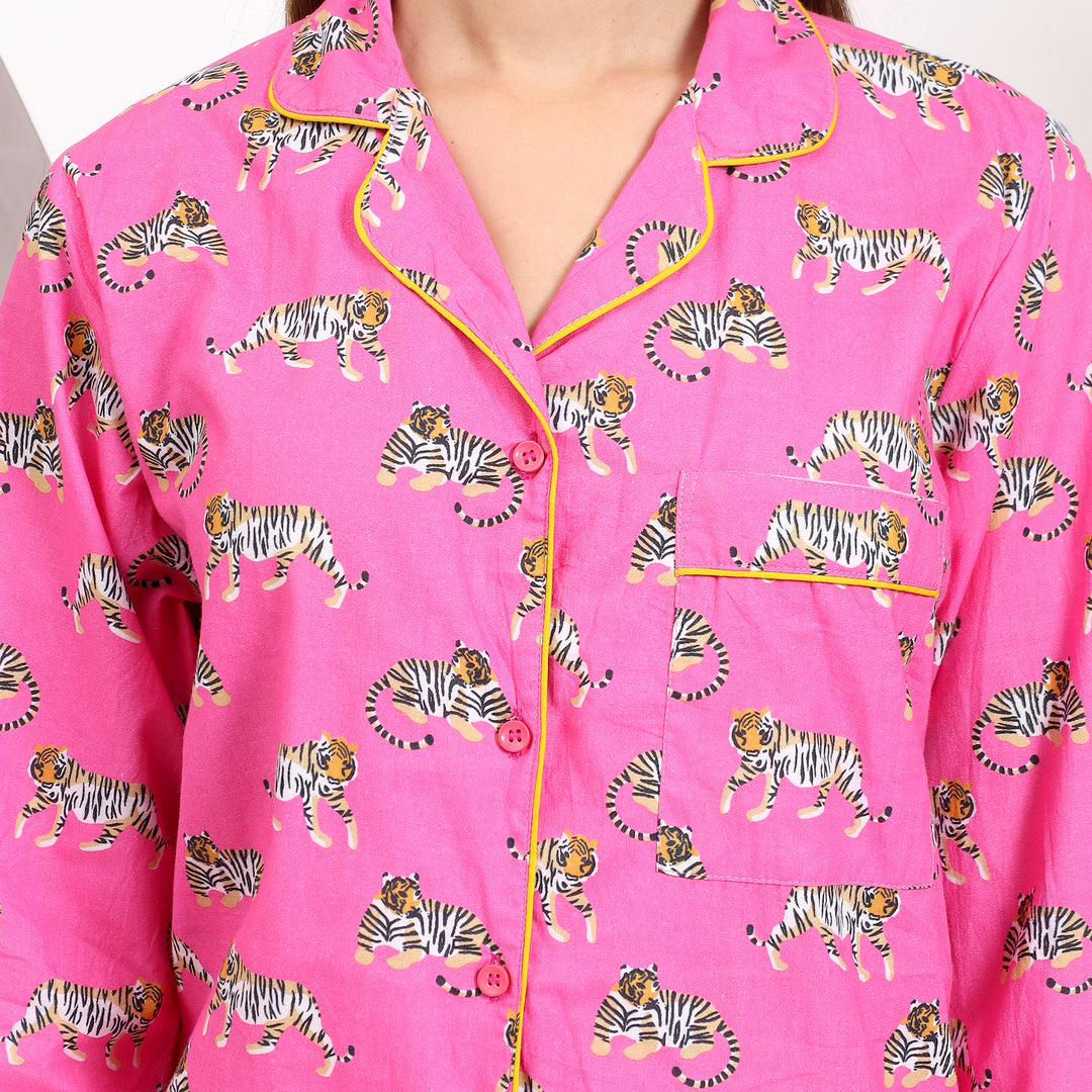 Close-up view of pink cotton pajama set showcasing the lapel collar and tiger print for a stylish look.