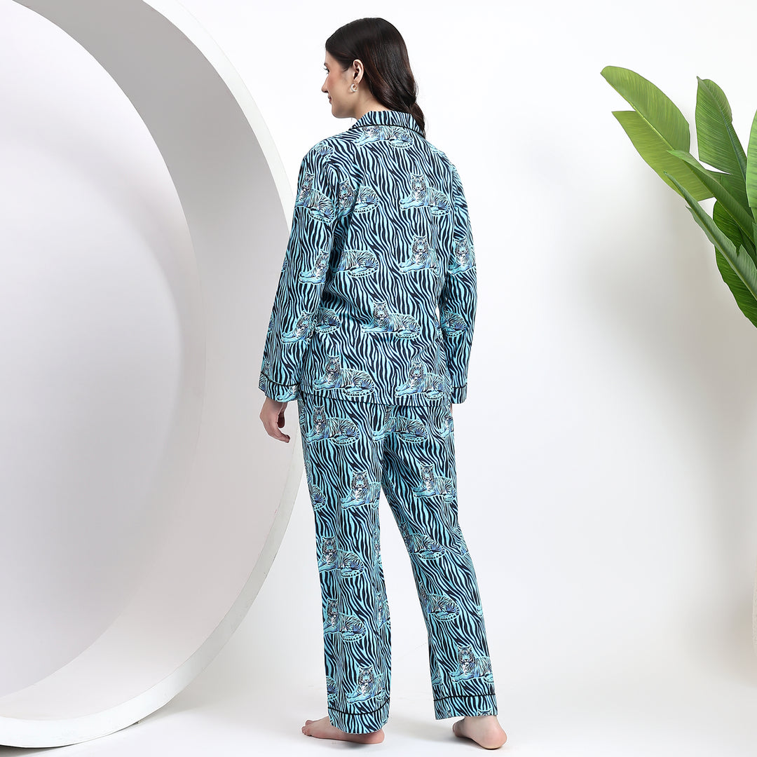 Back view of glacier blue cotton pj set showcasing its handblock print and simple, relaxed fit.