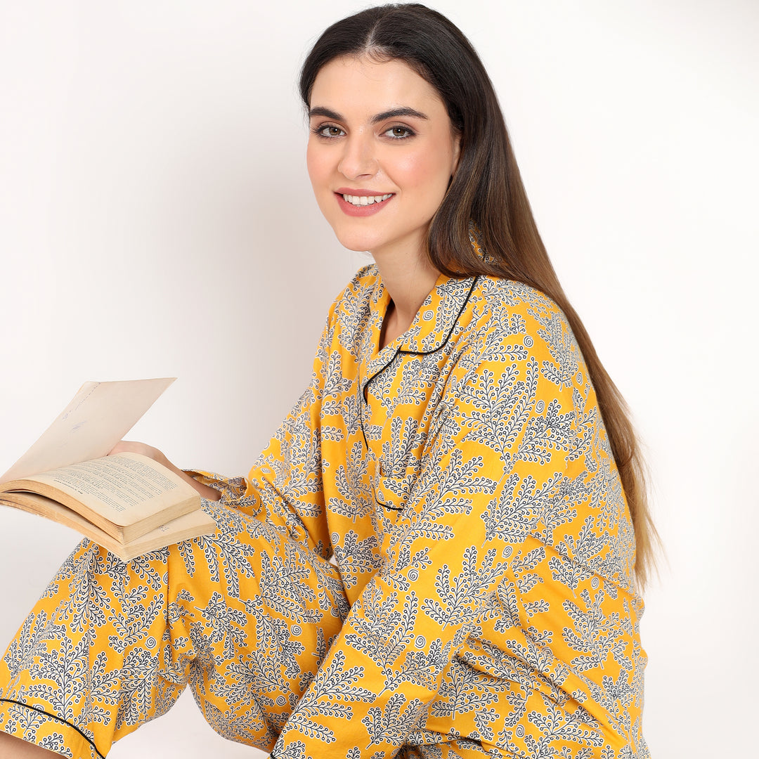 Close-up view of lapel collar and handblock floral print on yellow Long PJ Set