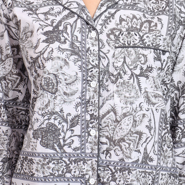 Close-up of lapel collar and floral print on off-white Long PJ Set.