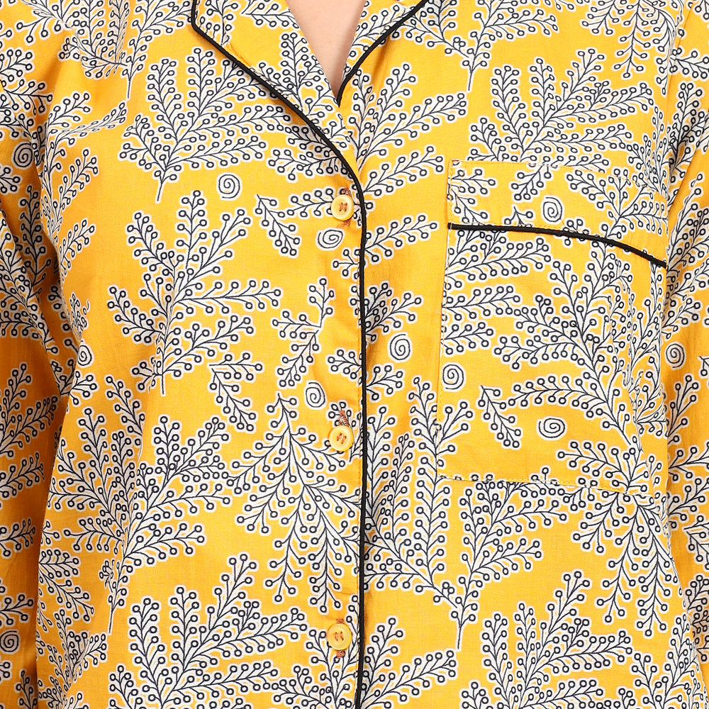 Close-up of lapel collar and floral print on yellow Long PJ Set.