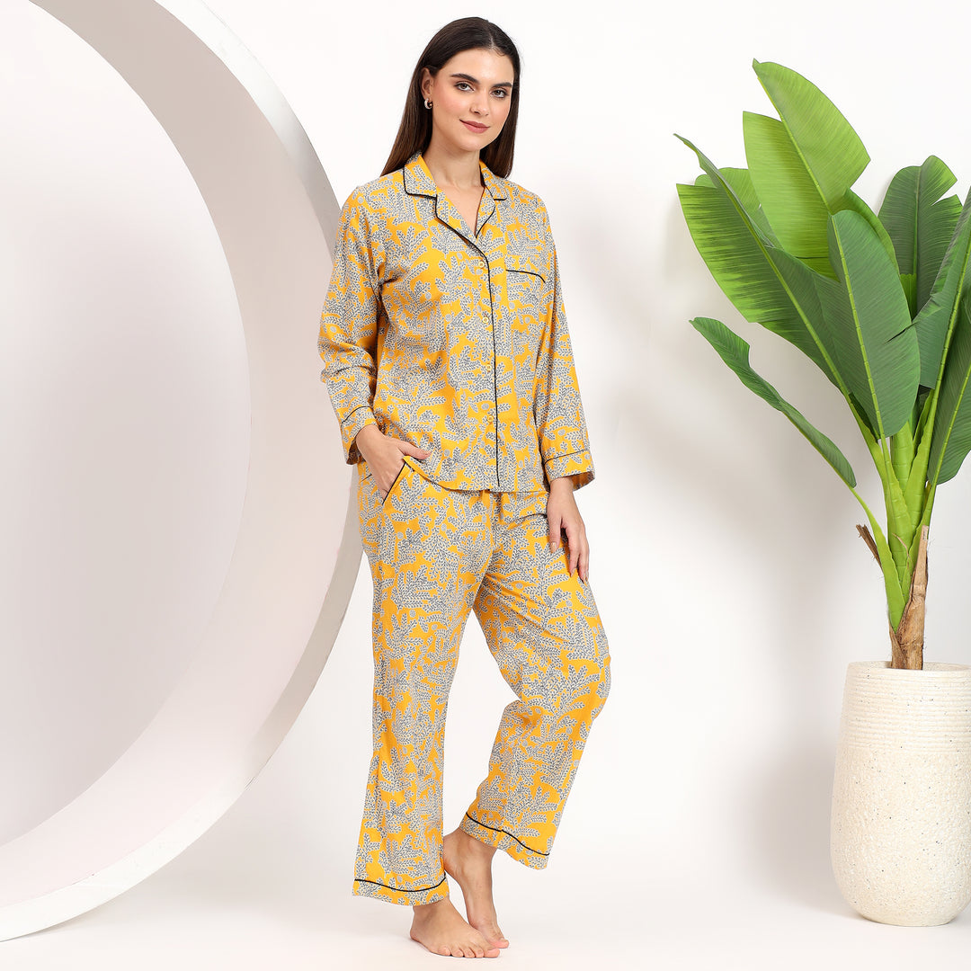 Styling view of yellow floral Long PJ Set highlighting the lapel collar and pajama fit.