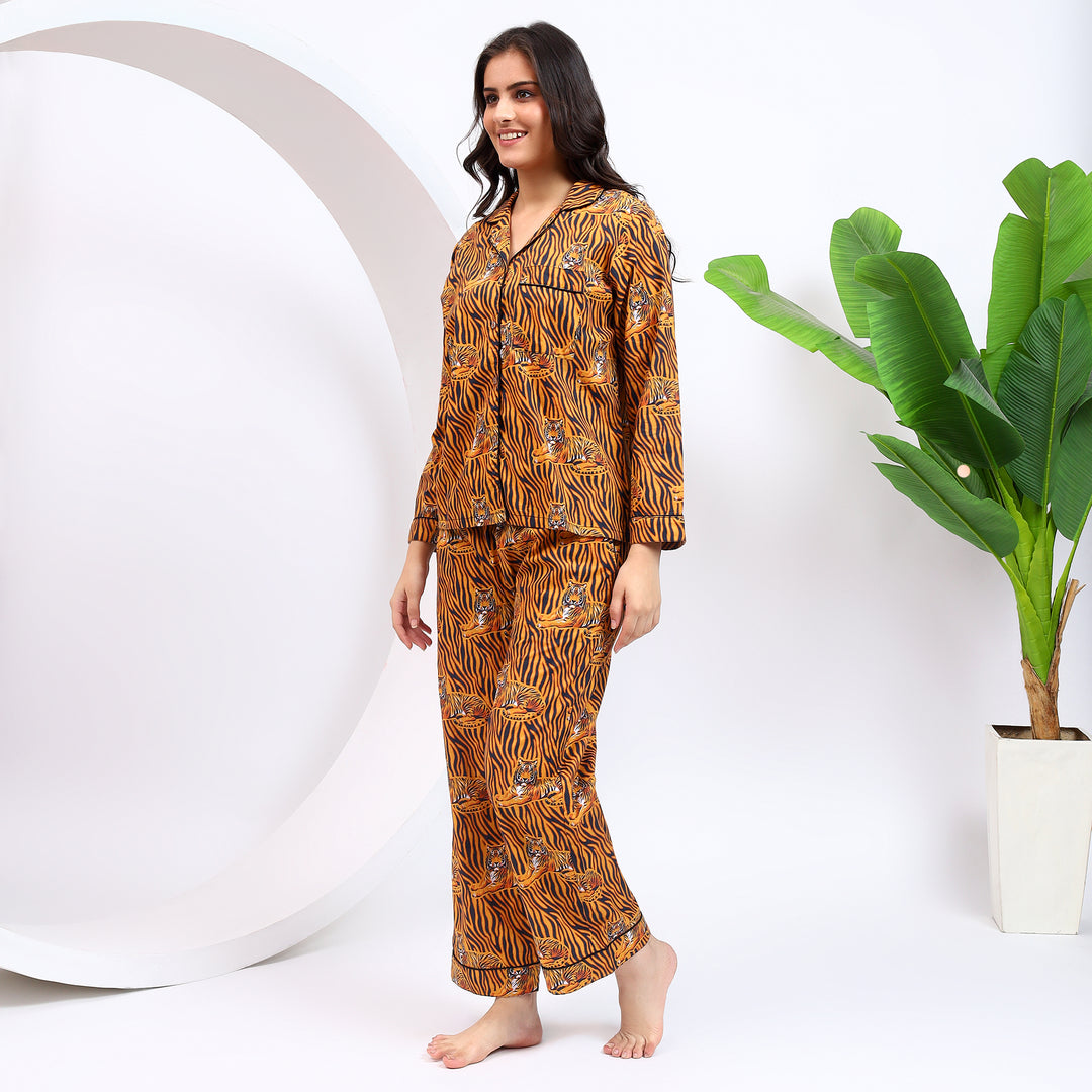 Styling angle of Orange Long PJ Set in Bagheera Print showing relaxed fit.