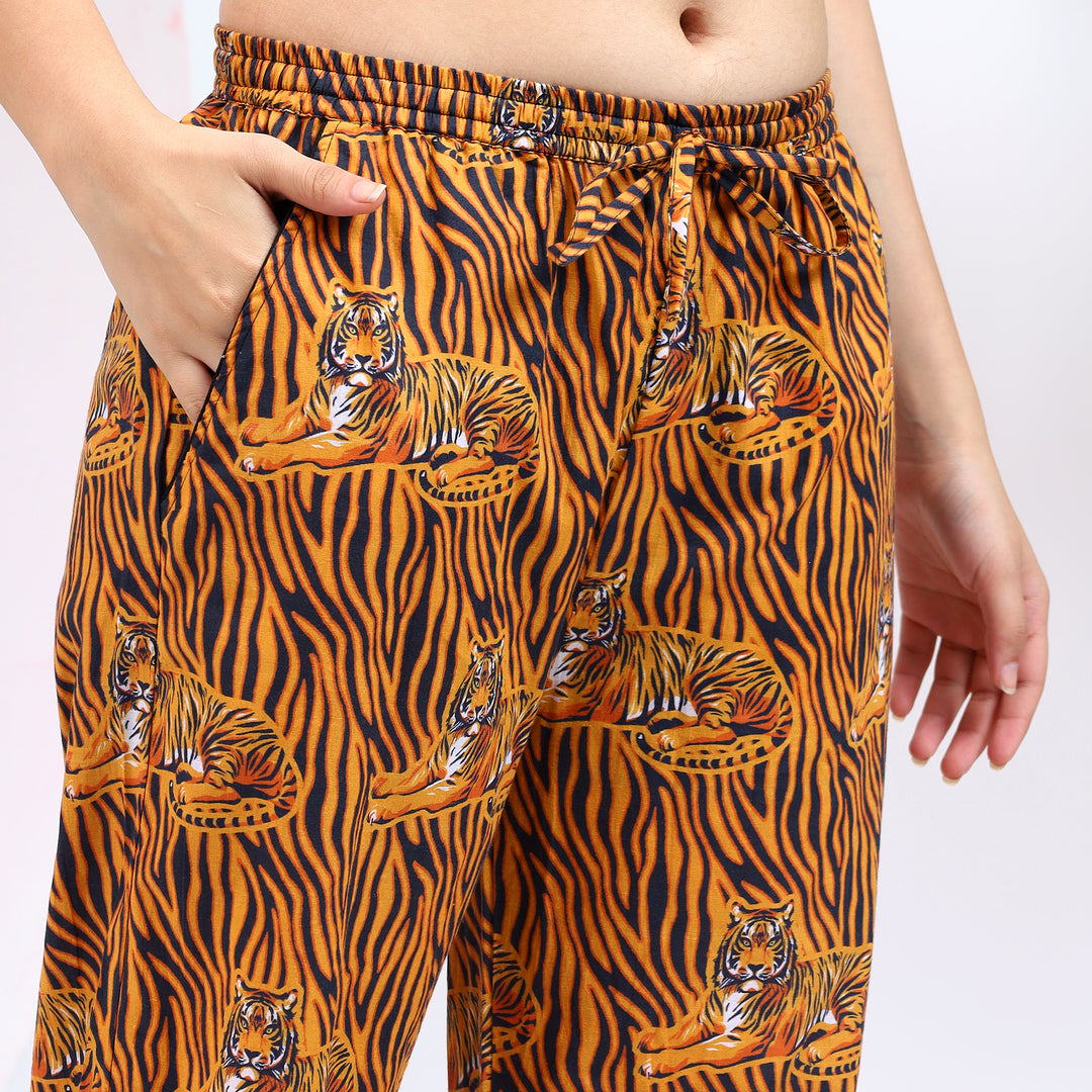 Side pocket view of Orange Long PJ Set in Bagheera Print for added convenience.