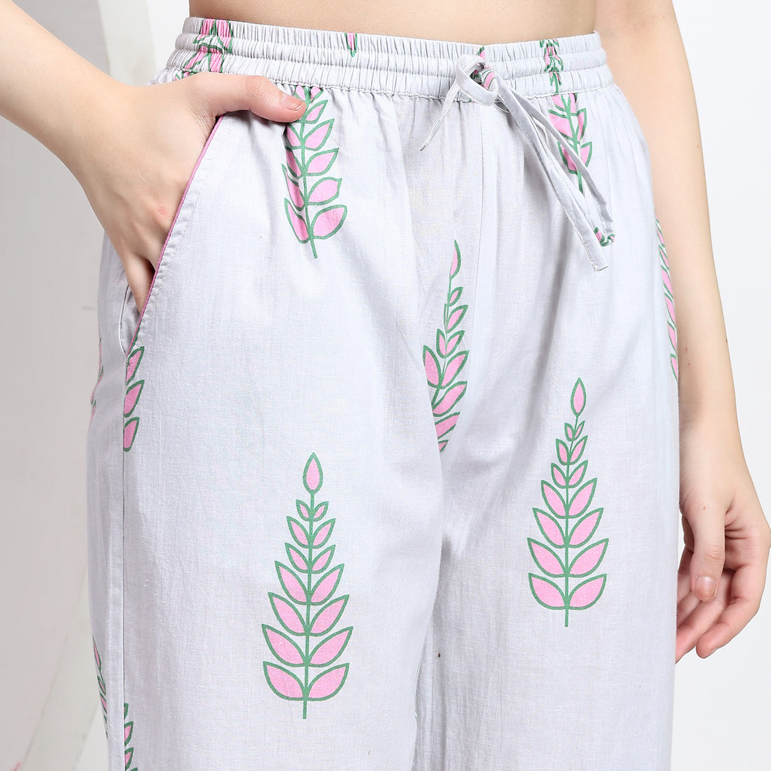 Close-up of side pocket on white cotton pj set with floral handblock print, ideal for casual wear.